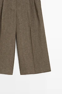 Flowing melange linen Bermuda shorts