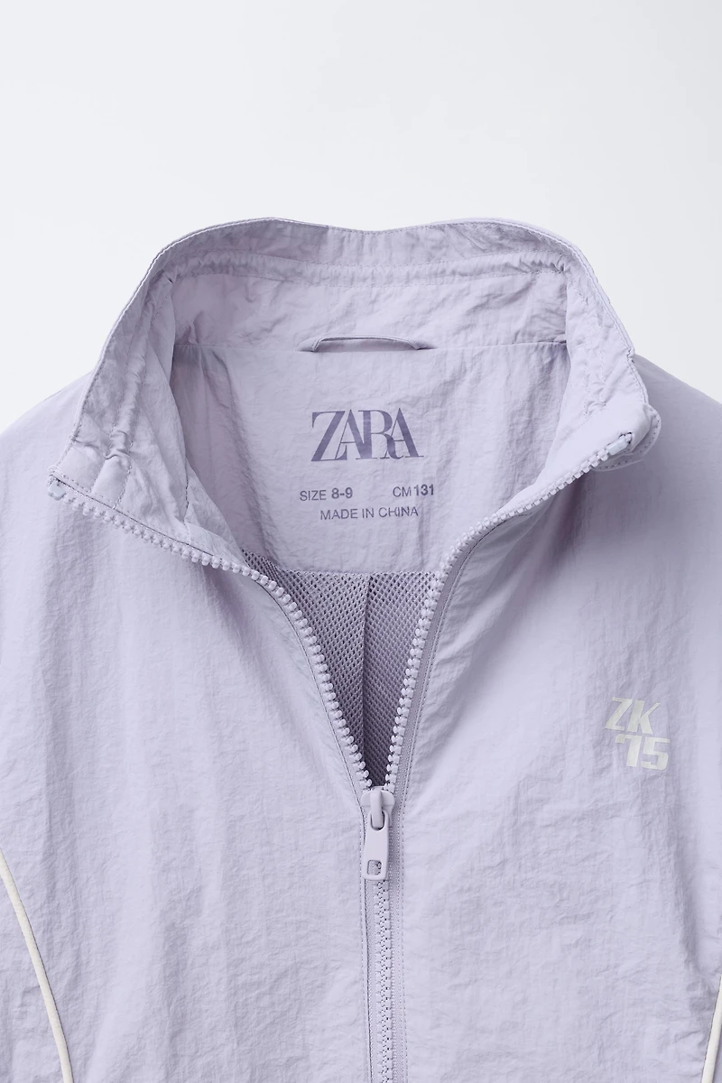 NYLON JACKET WITH CONTRAST PIPING