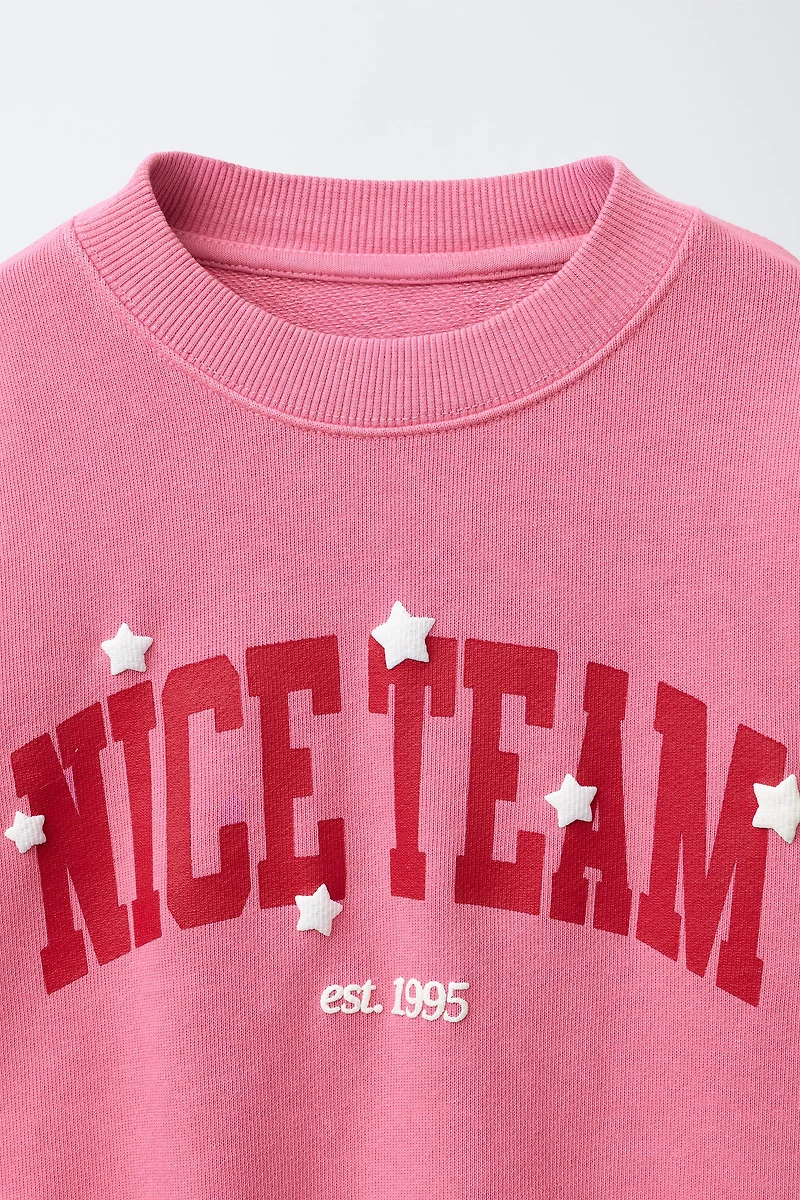 VARSITY PRINT SWEATSHIRT