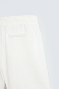 BERMUDA DE JOGGING DÉLAV