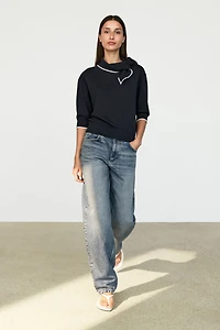 100% cotton knit sweater with scarf detail