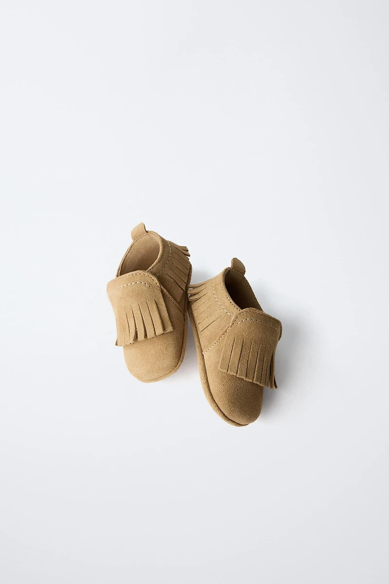 CHAUSSURES EN CUIR