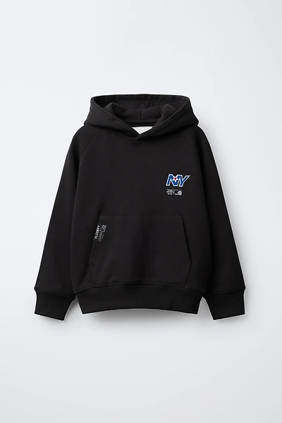 SWEAT POCHE BRODÉE