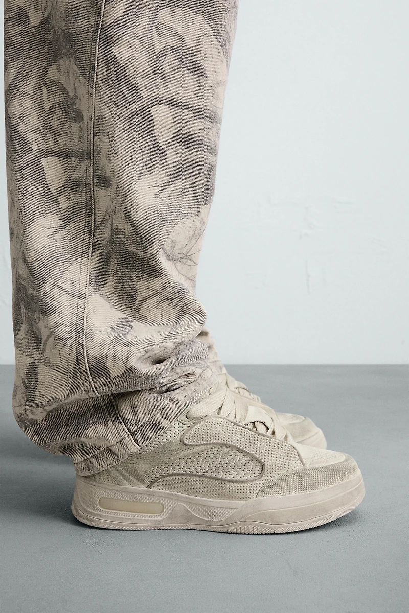 DISTRESSED THICK-SOLED SNEAKERS