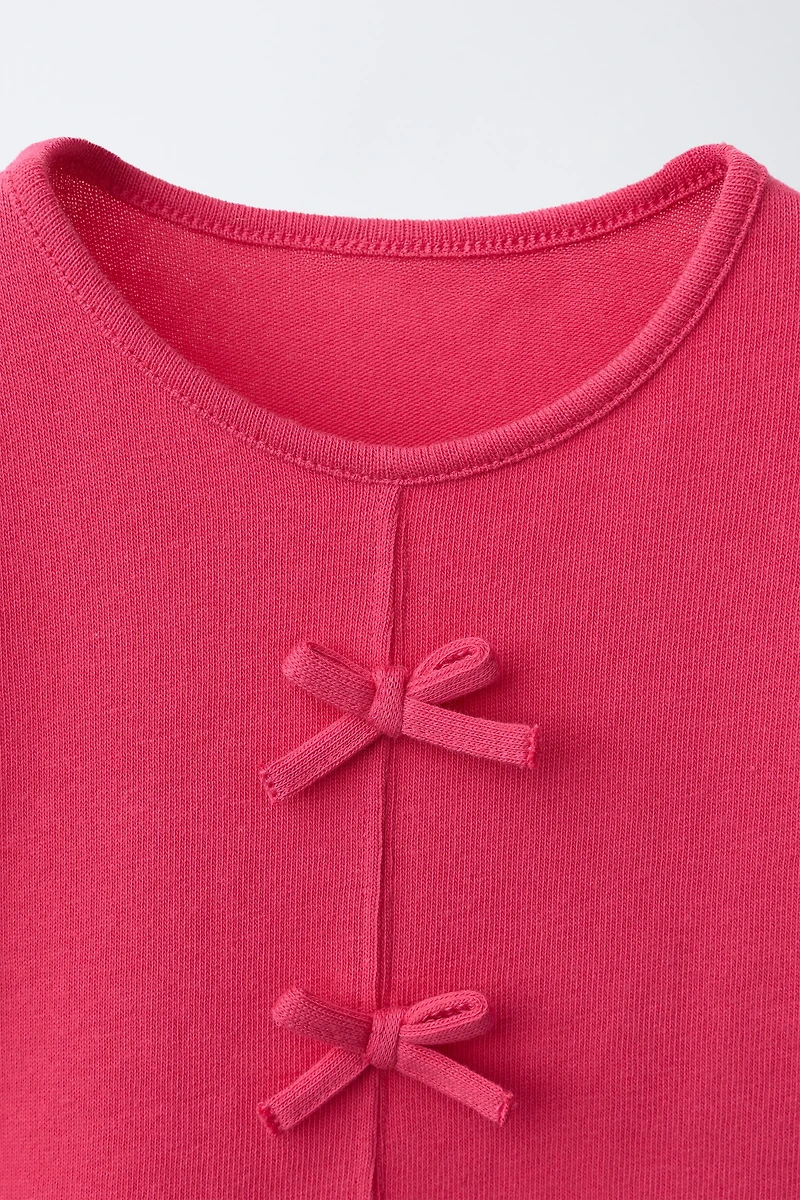 BOW AND RUFFLE T-SHIRT
