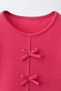 BOW AND RUFFLE T-SHIRT