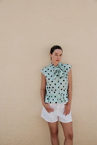 SLEEVELESS POLKA DOT BOW SHIRT