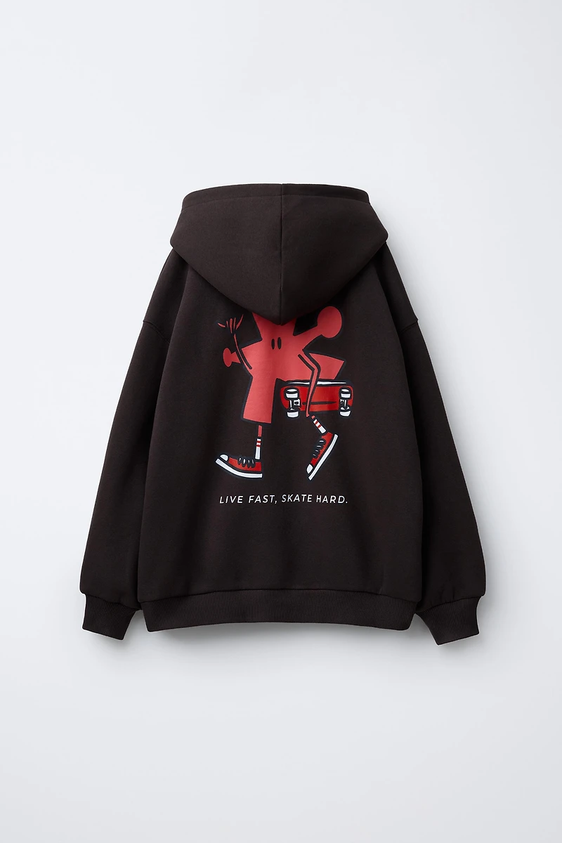 SWEAT À CAPUCHE IMPRIMÉ