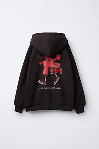 SWEAT À CAPUCHE IMPRIMÉ