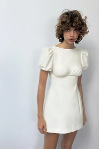 SHORT PLEATED DRESS WITH POCKETS