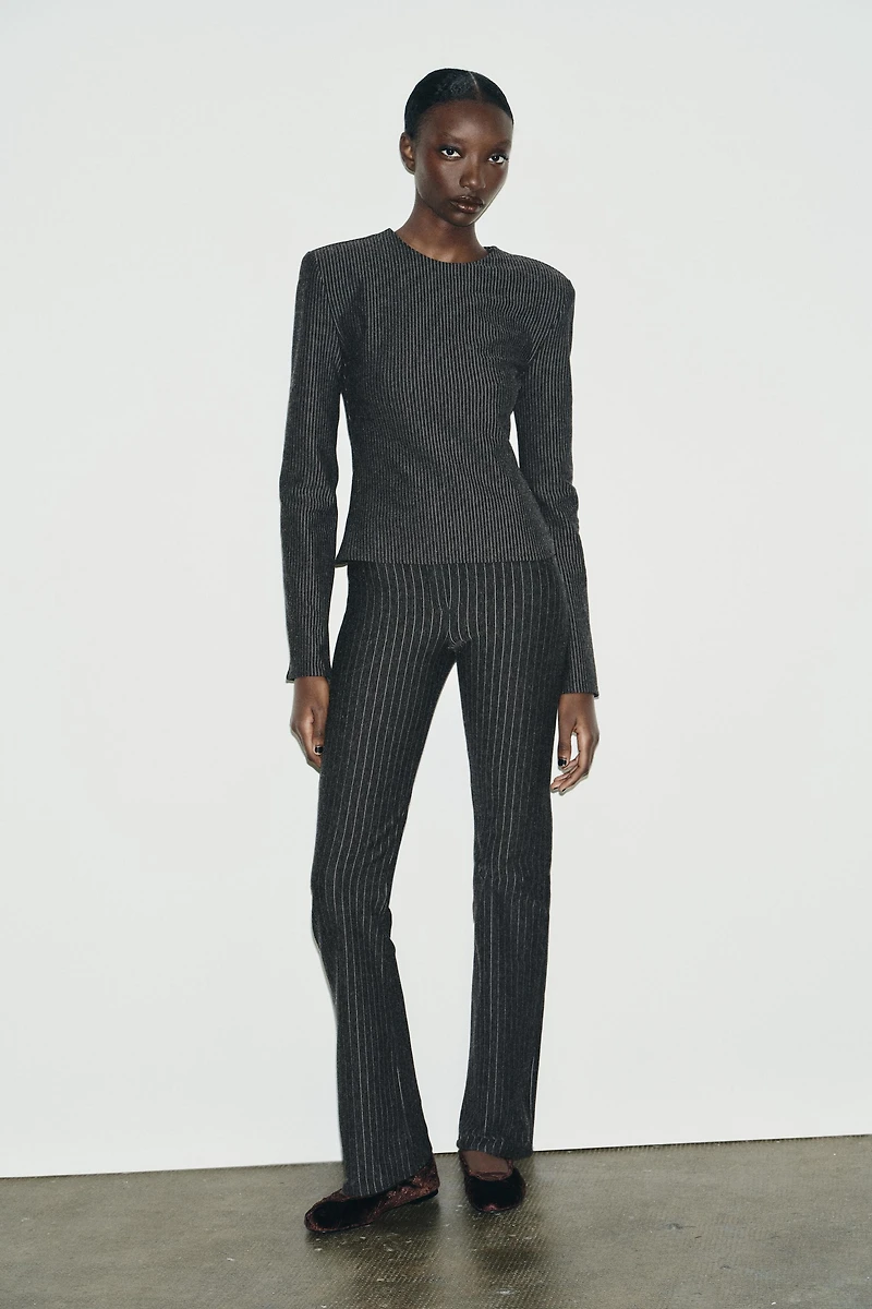 PINSTRIPED SHOULDER PAD TOP