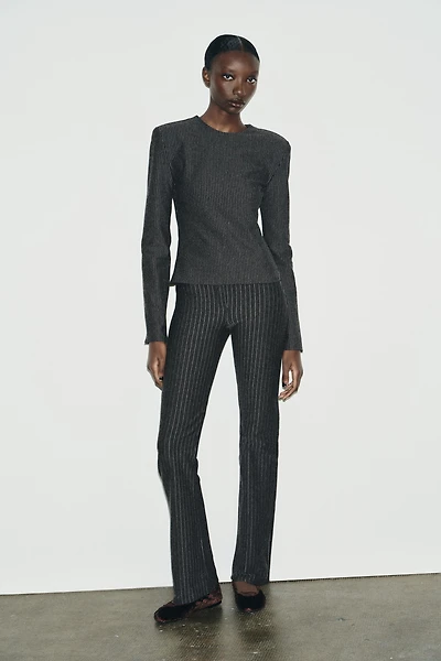 PINSTRIPED SHOULDER PAD TOP