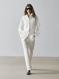Bib front shirt with embroidered detail