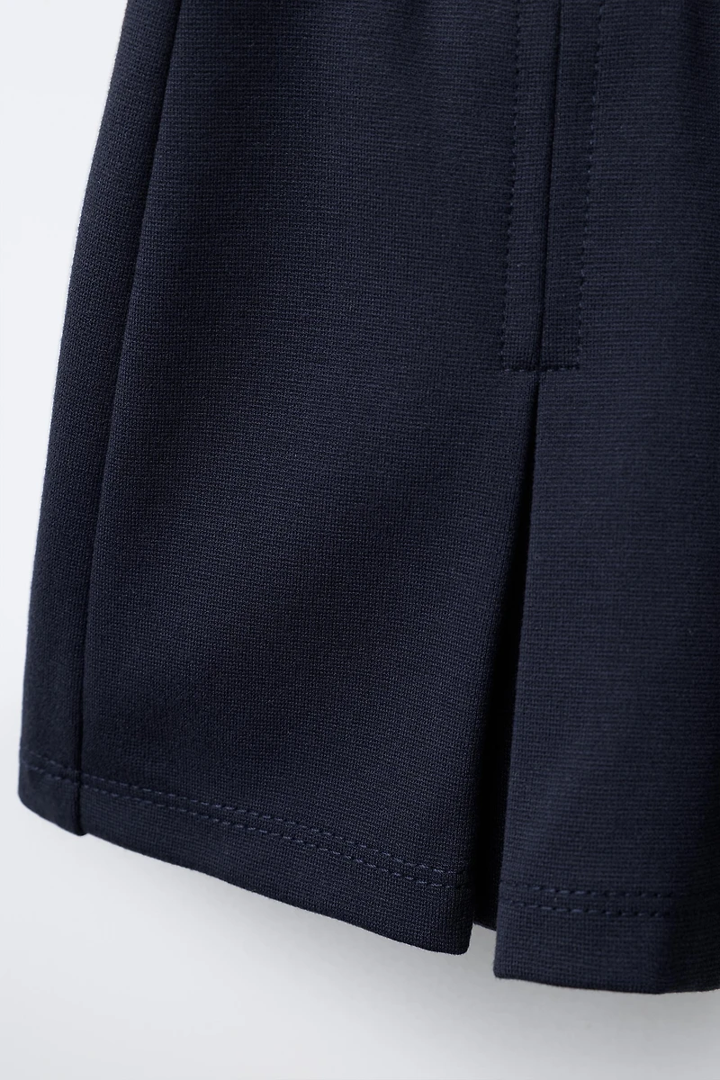 JUPE-SHORT BERMUDA PLIS