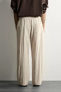 CRINKLED EFFECT TECHNICAL RELAXED FIT PANTS
