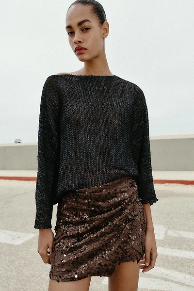 JUPE-PANTALON MINI À PAILLETTES ET NŒUD