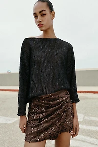 JUPE-PANTALON MINI À PAILLETTES ET NŒUD