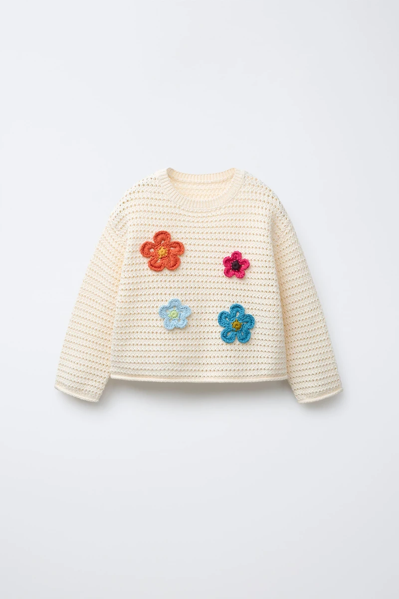 PULL EN MAILLE À FLEURS