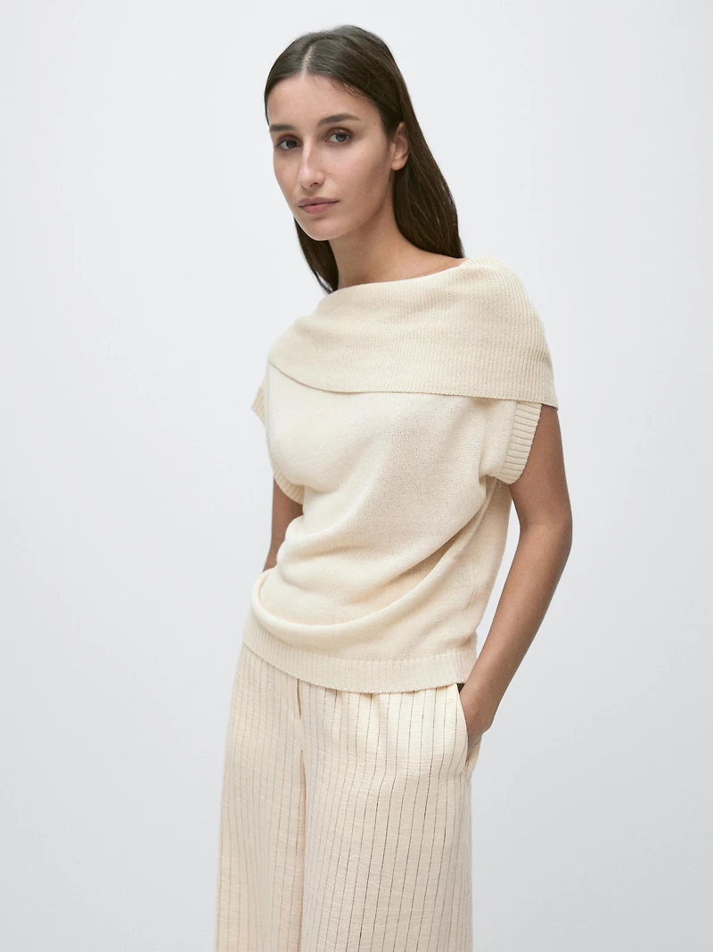 Knit sweater with low-cut back