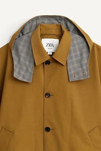 PONCHO DÉPERLANT À CONTRASTE ET CARREAUX ÉDITION LIMITÉE