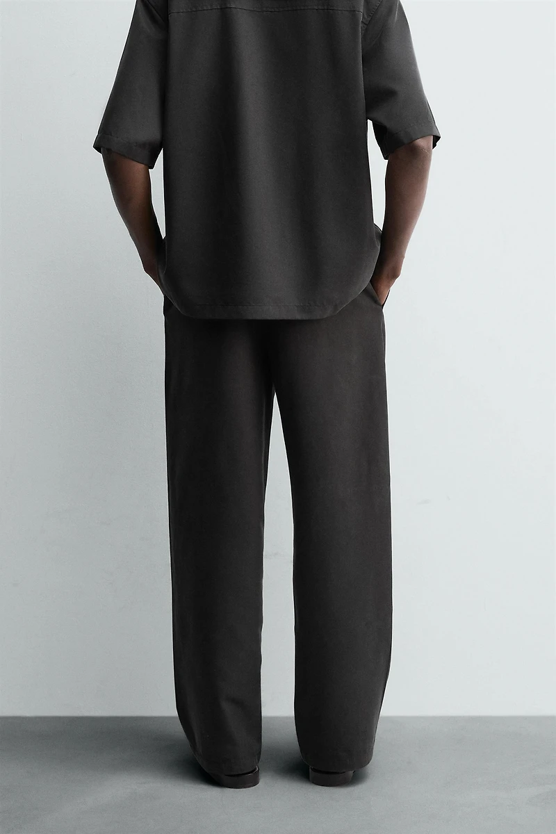 RELAXED FIT FLOWY PANTS