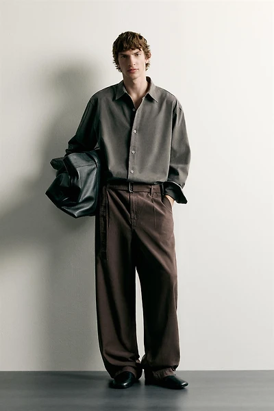 RELAXED FIT BELTED PLEATED PANTS