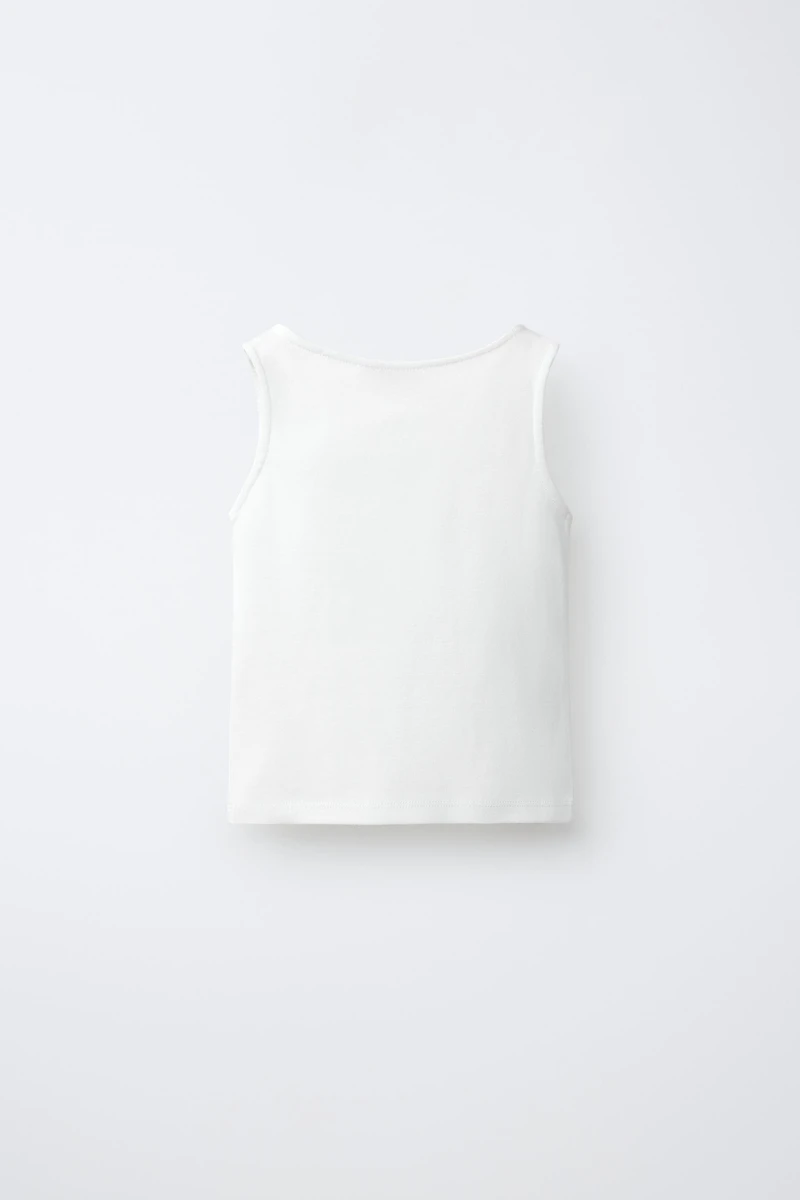 T-SHIRT BOUTONS