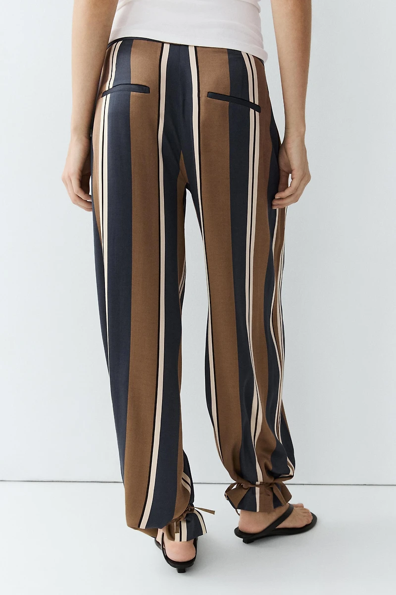 Satin pants with tie-up hem detail