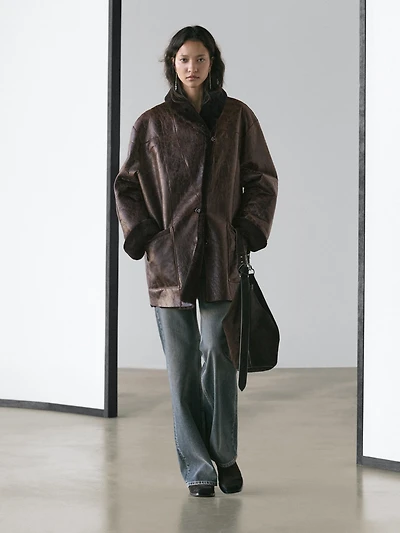 Mouton leather coat with crackled finish