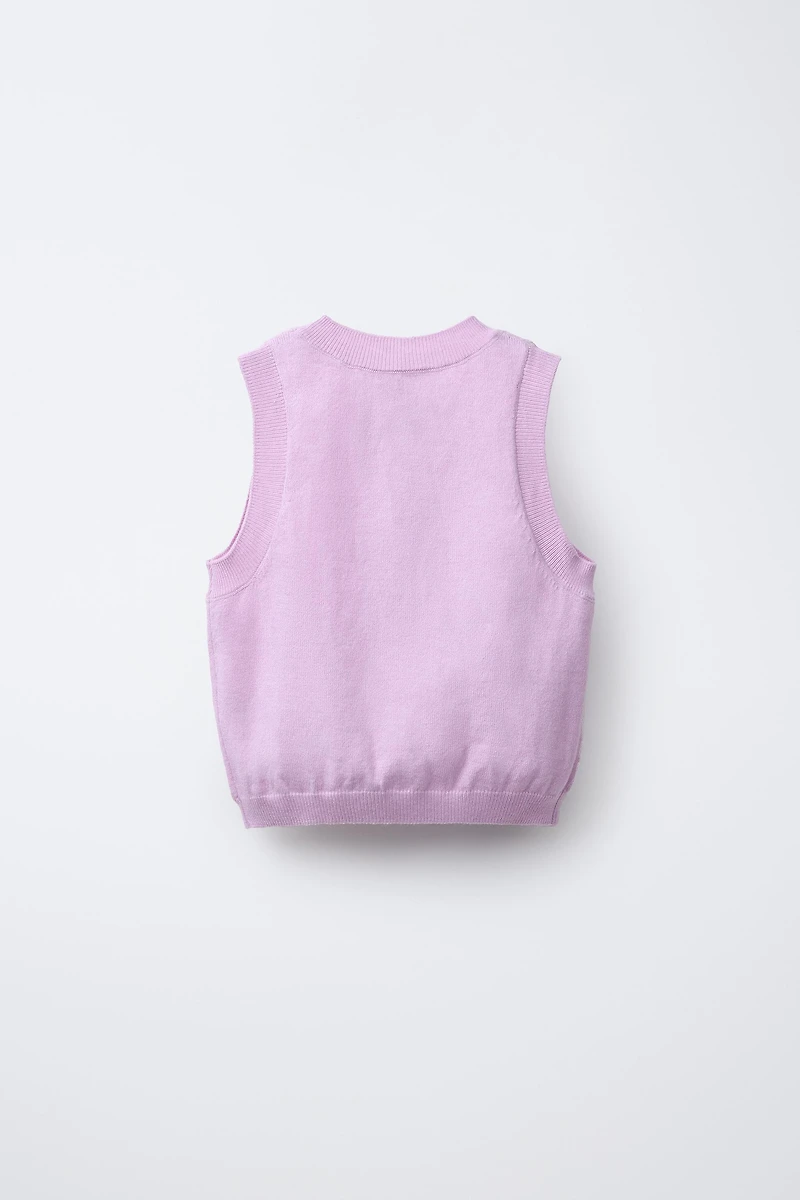 TOP EN MAILLE À SEQUINS