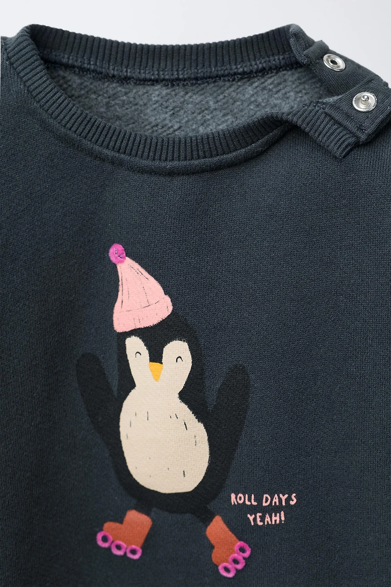 PENGUIN PRINT SWEATSHIRT
