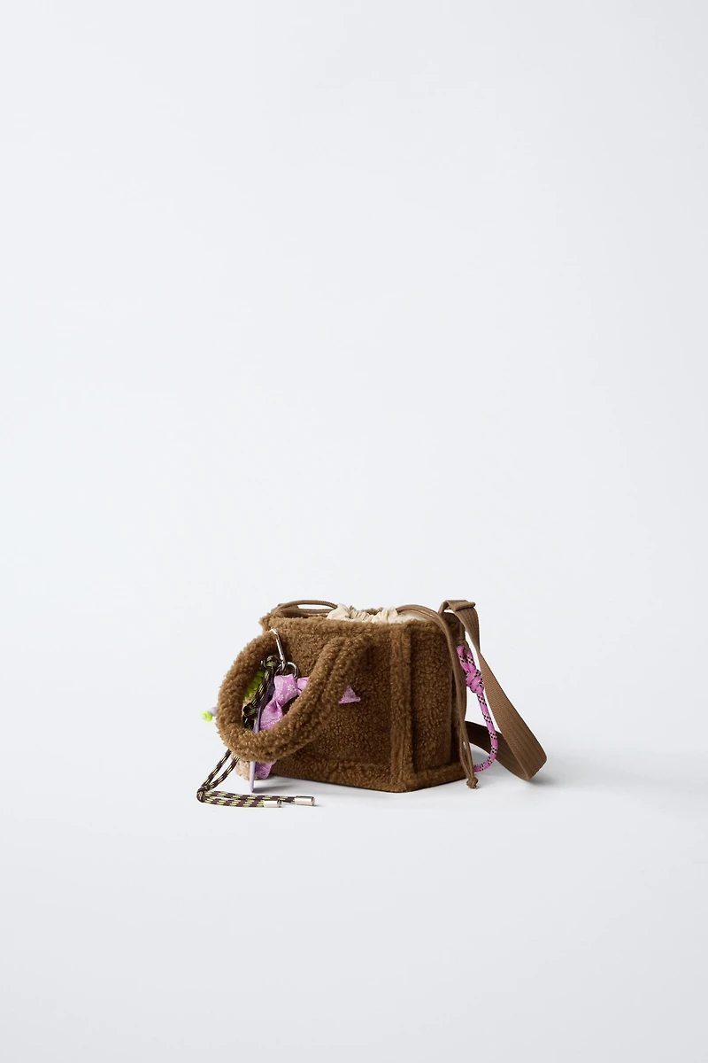 FLEECE CHARM CROSSBODY BAG