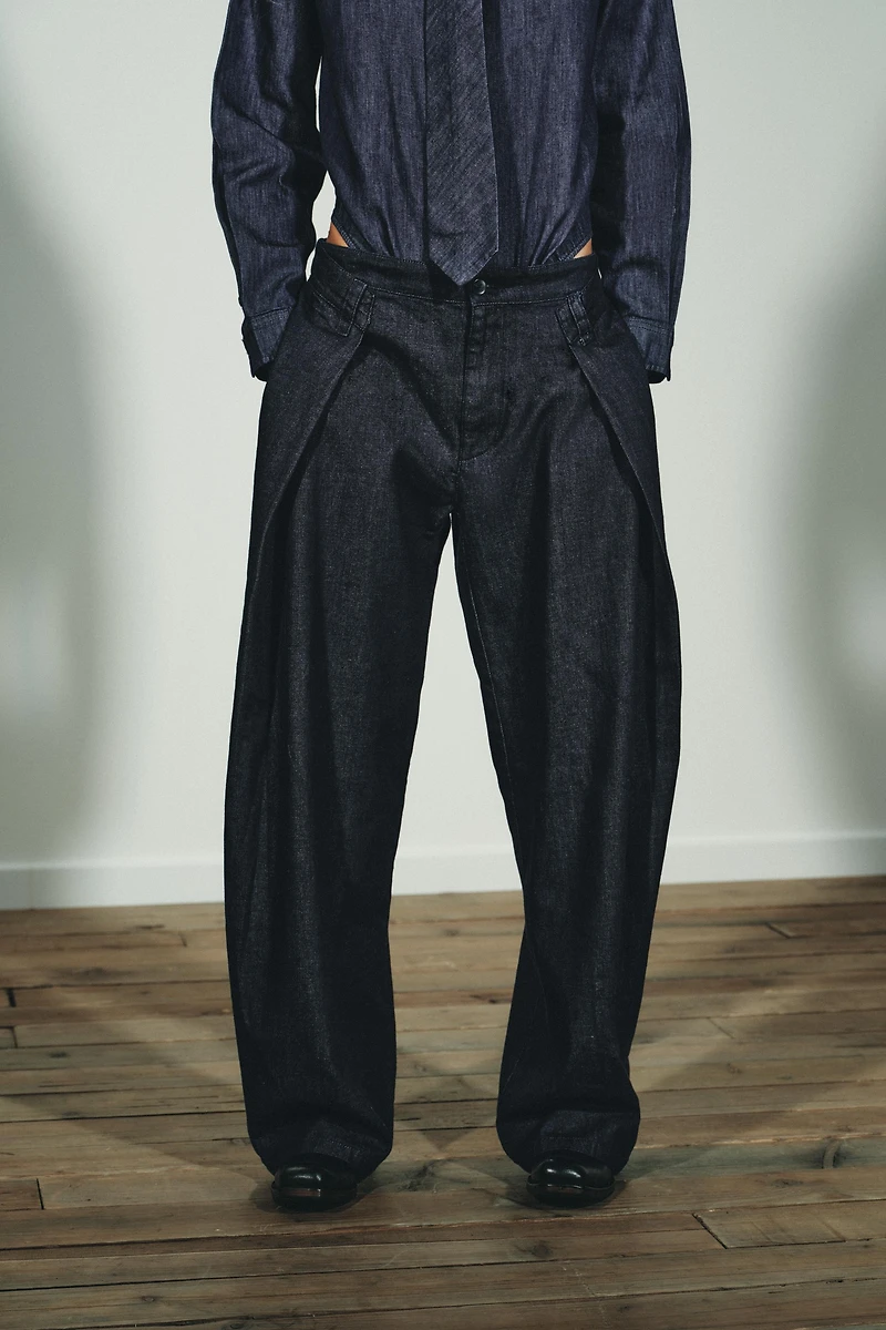 PLEATED FAUX DENIM PANTS