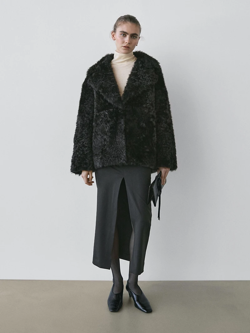 Sheepskin leather coat with lapel collar