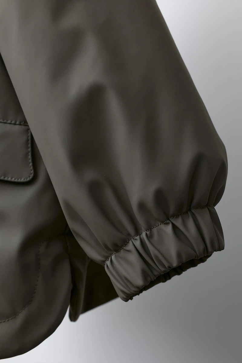 WATER-RESISTANT RUBBERIZED FLEECE-LINED RAINCOAT