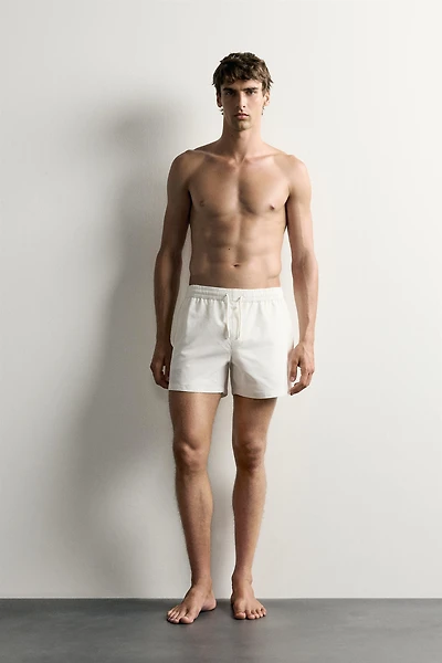 MID-LENGTH SEERSUCKER SWIMSUIT