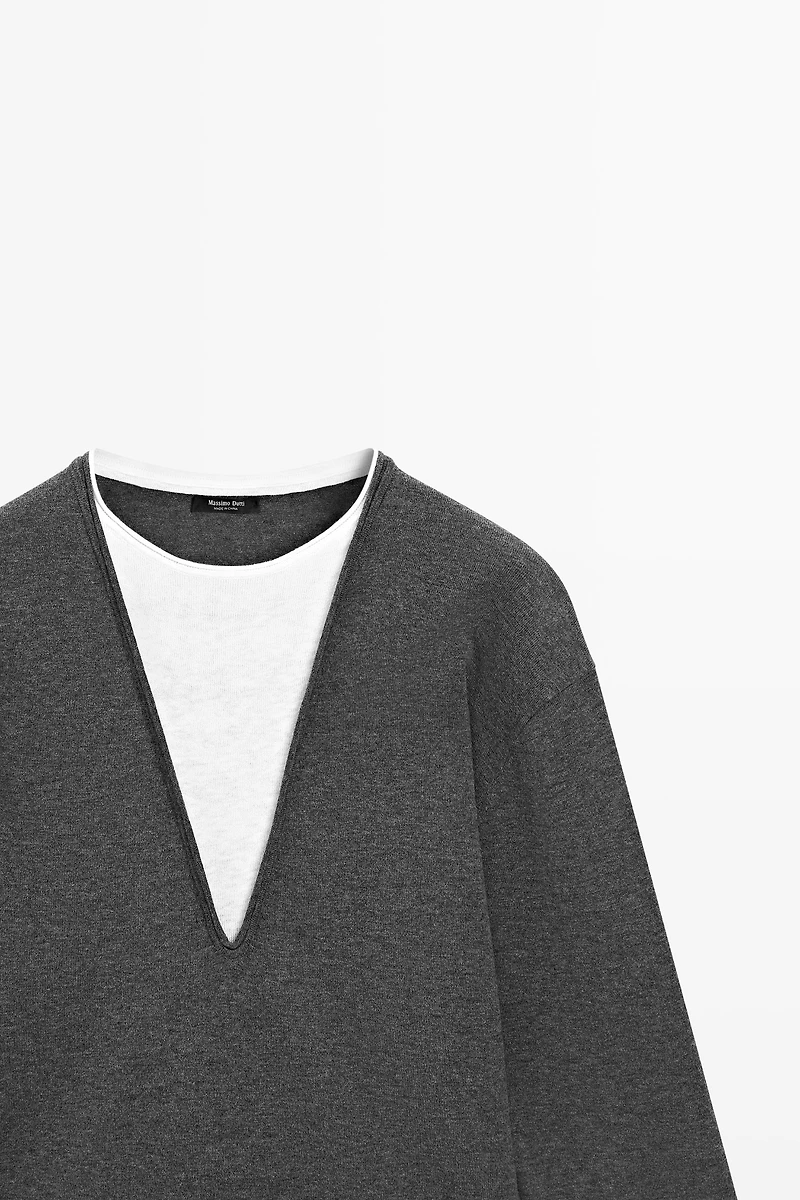Cotton blend knit sweater with contrast fabric