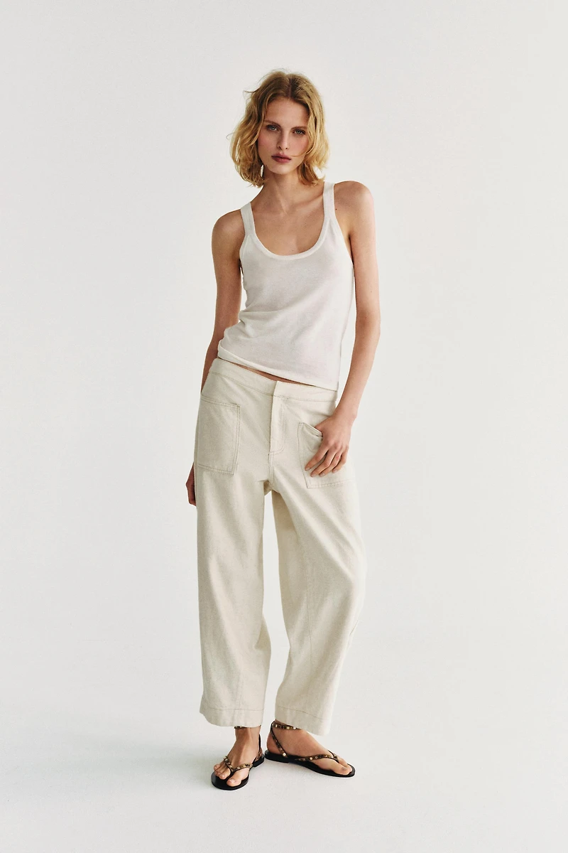 TOP EN MAILLE FINE SANS MANCHES