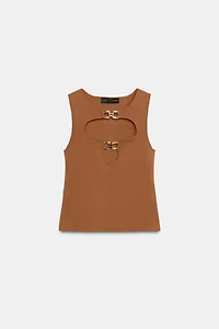 CUT OUT KNIT TOP WITH METAL DETAIL