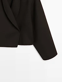 Short coat with rounded lapels