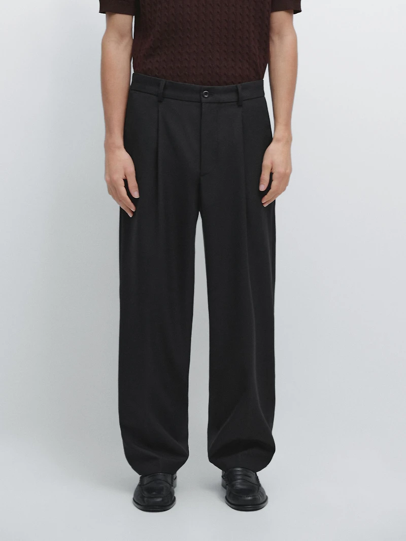 Relaxed fit wool trousers with dart detail