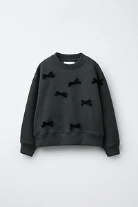 VELVET BOW SWEATSHIRT