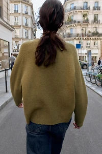 BUTTON KNIT SWEATER
