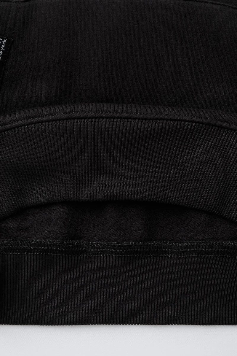 SWEAT POCHE BRODÉE