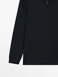 Polo à col montant zippé