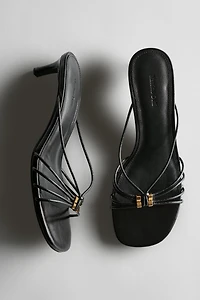 Strappy heeled sandals with embellished detail