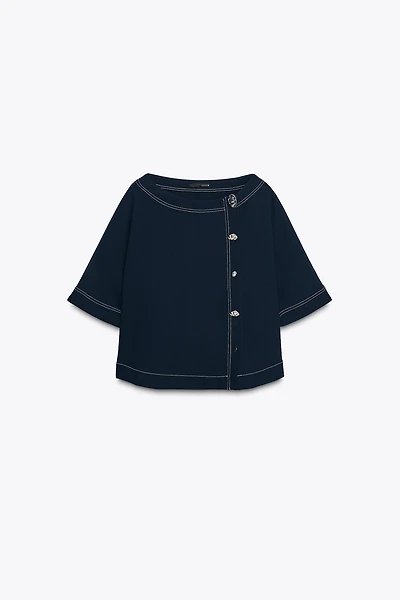 TOPSTITCHED TOP