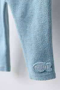 PANTALON EN MAILLE AVEC DÉCOR POISSON