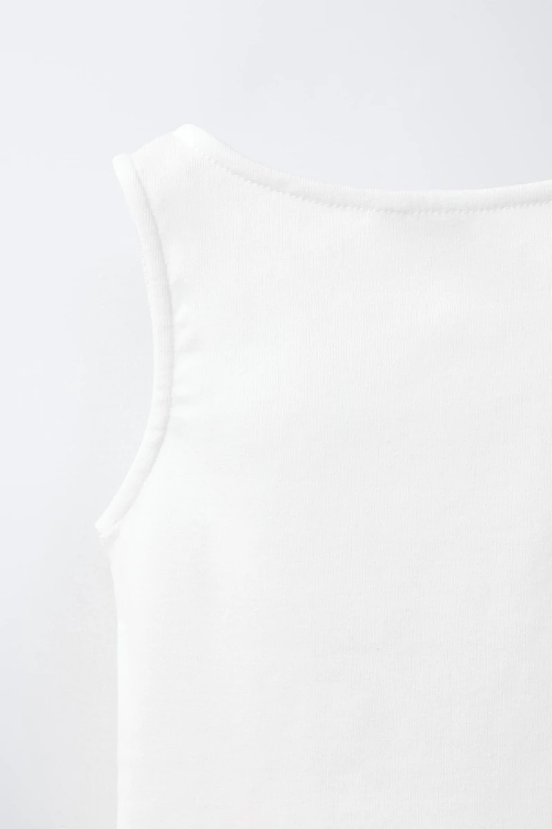 T-SHIRT BOUTONS