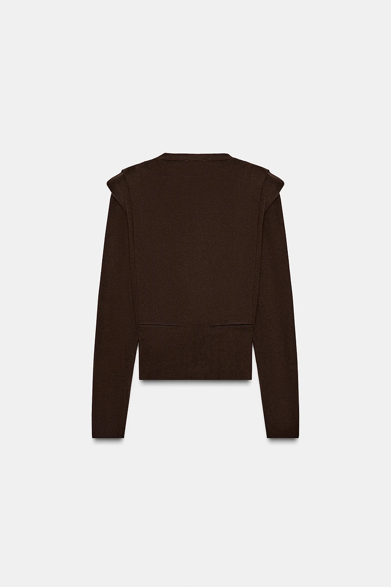 PULL EN MAILLE À ÉPAULETTES